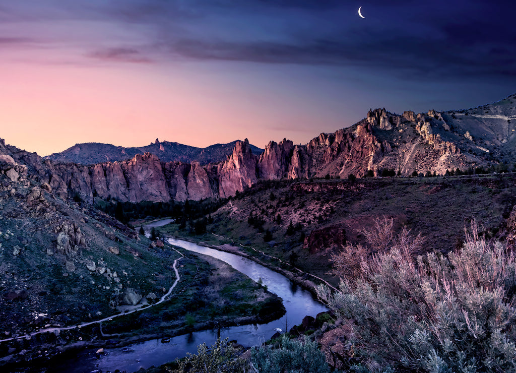 Smith Rock State Park landscape of mountains and a river under a violet evening sky in Bend, Oregon USA