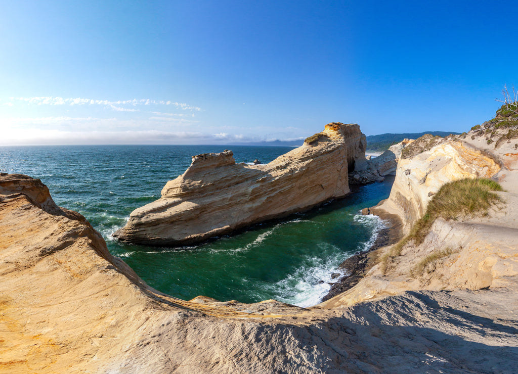 Scenic panorama on Cape Kiwanda state park, Oregon. Beautiful view overlooking cape cliff, rocks, ocean and a shoreline