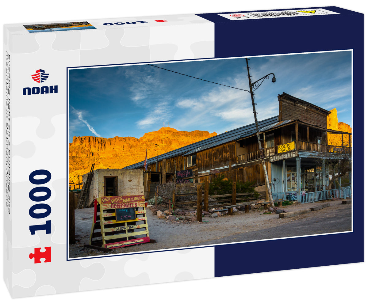 Evening light on a building and mountains in Oatman, Arizona