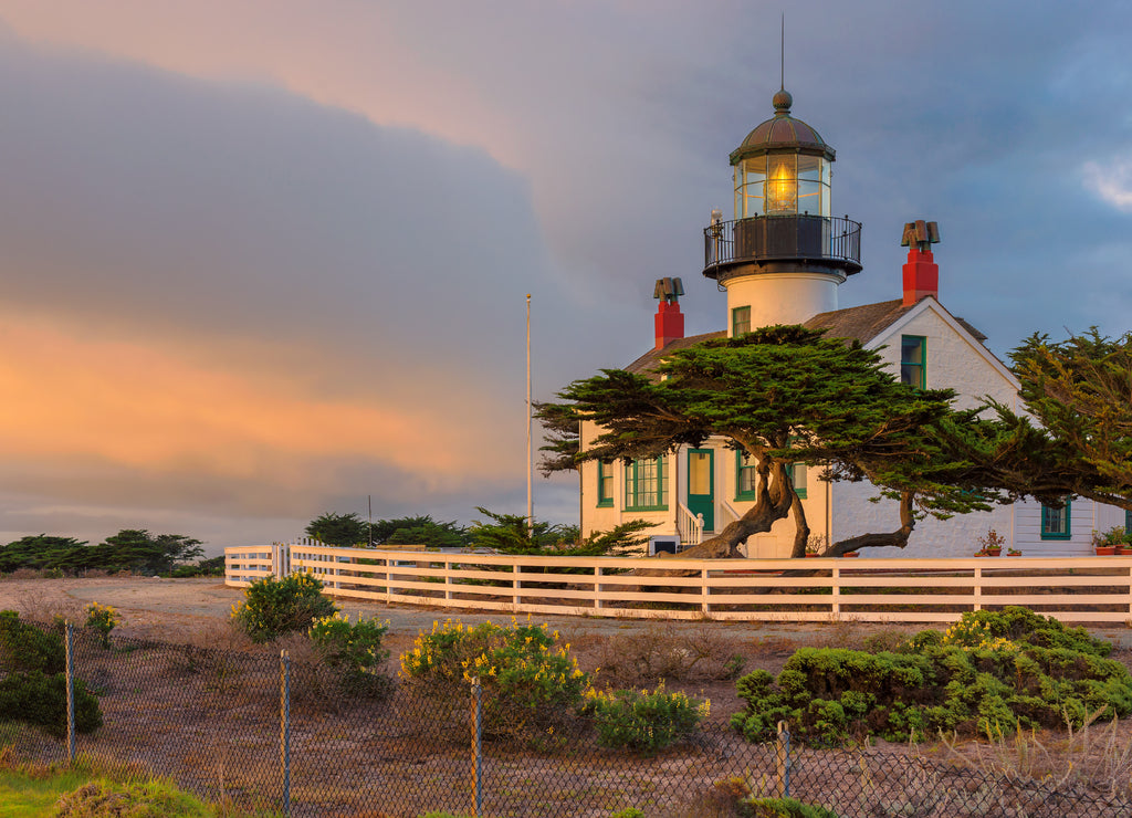 California lighthouse with dramatic sky. Point Pinos lighthouse at sunset in Pacific Grove, Monterey, California