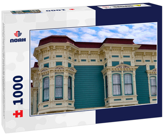 Closeup of traditional house in the city of Ferndale in Humboldt County, California, USA, famous for its Victorian architecture, a sunny day with blue sky and clouds in summer