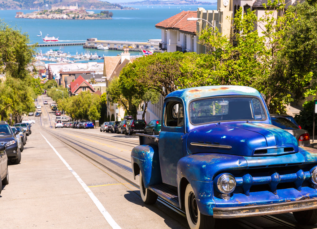 San Francisco Hyde Street and vintage car with Alcatraz, California