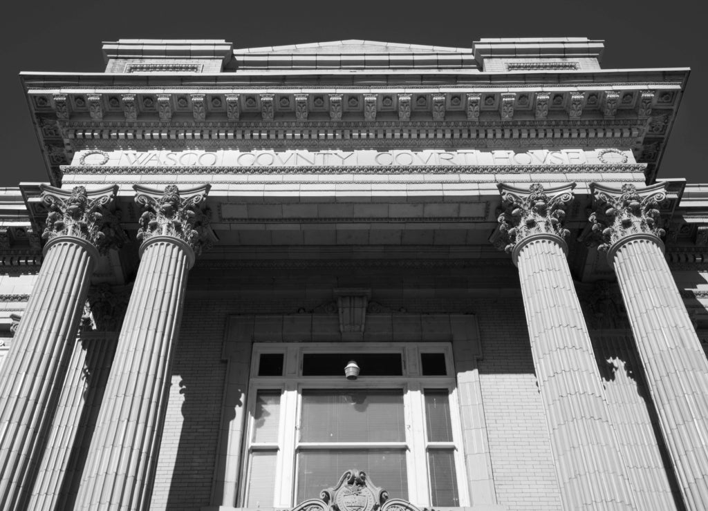 The Wasco County Courthouse, built in 1914, in The Dalles, Oregon in black white