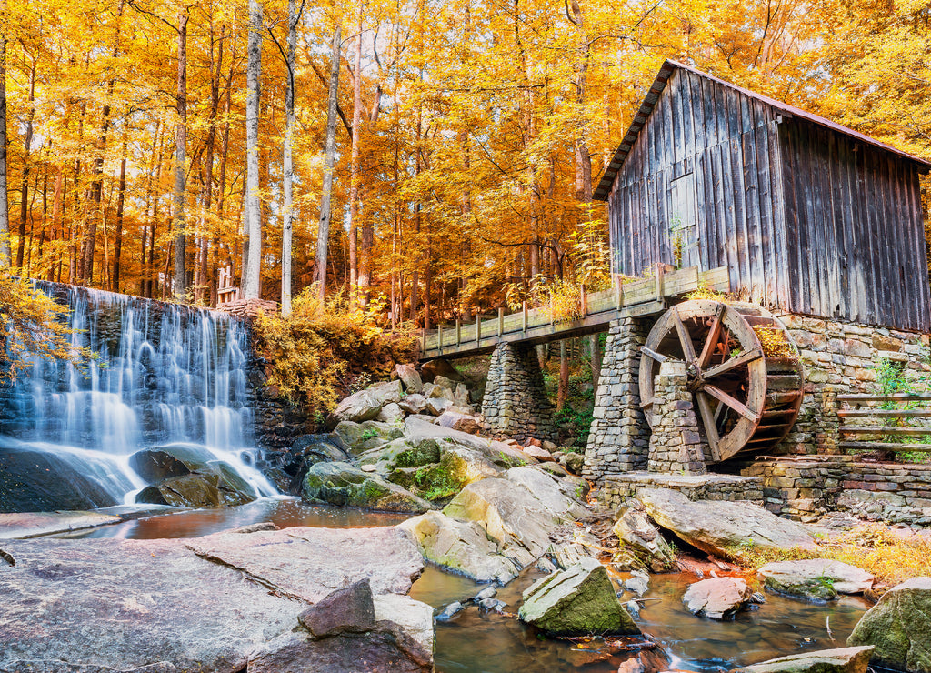 Fall or Autumn image of historic mill and waterfall in Marietta, Georgia