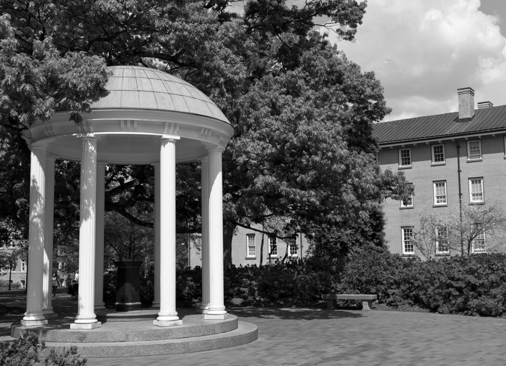 The Old Well at UNC Chapel Hill during the spring with azaleas blooming  North Carolina in black white