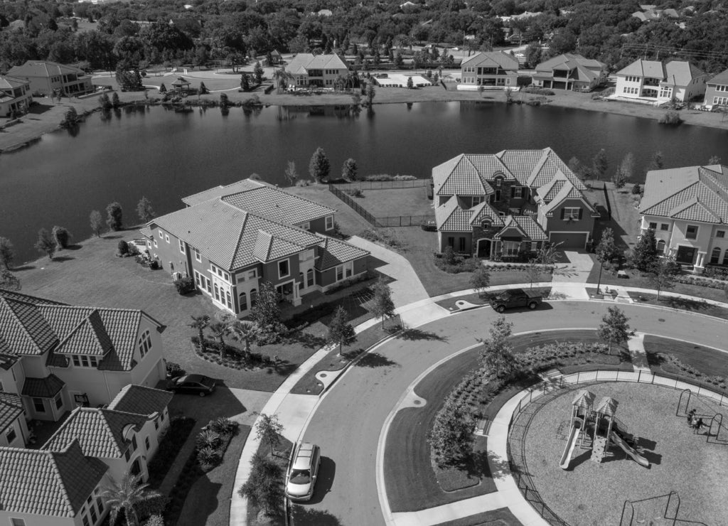 Aerial drone image of luxury homes in Orlando Florida in black white