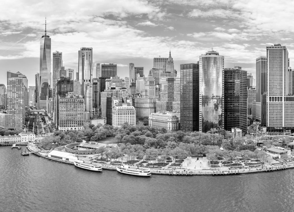 Aerial panorama of Downtown New York skyline viewed from above Upper Bay in black white