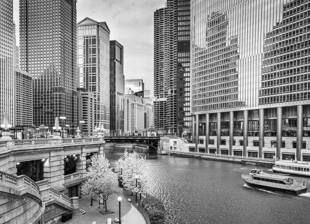 Chicago, Illinois, USA sightseeing cruise and skyline on the river in black white