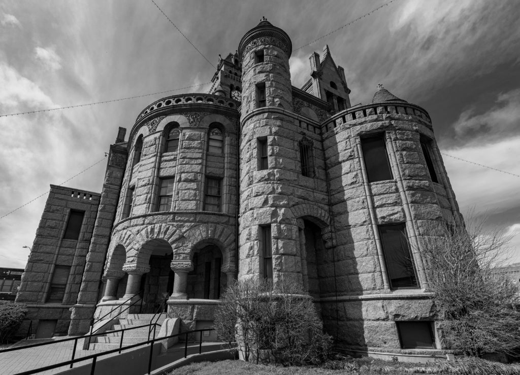 Wise County, Texas Courthouse with blue sky in background in black white