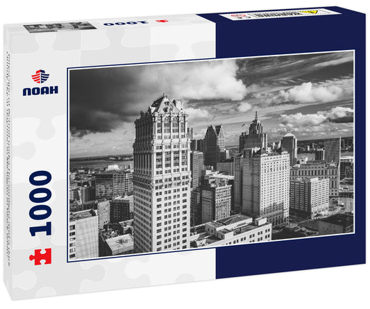 Cityscape of Detroit under the sunlight and a dark cloudy sky at daytime in Michigan in black white