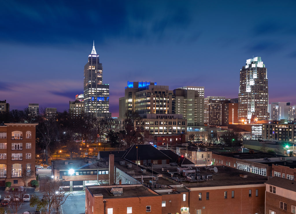 The skyline of Raleigh during a colorful sunset North Carolina