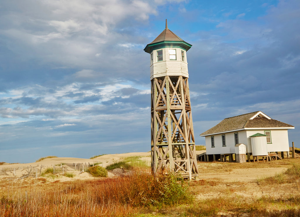 Wood lookout and lighthouse overlooking the outer banks of North Carolina