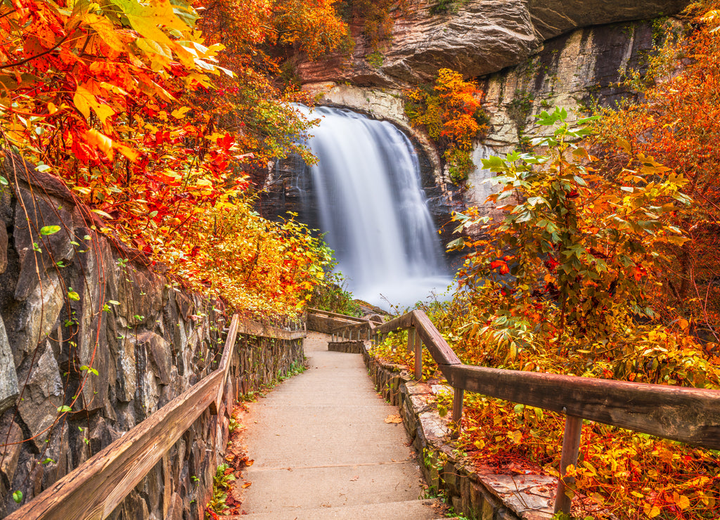 Looking Glass Falls in Pisgah National Forest, North Carolina, USA with early autumn foliage